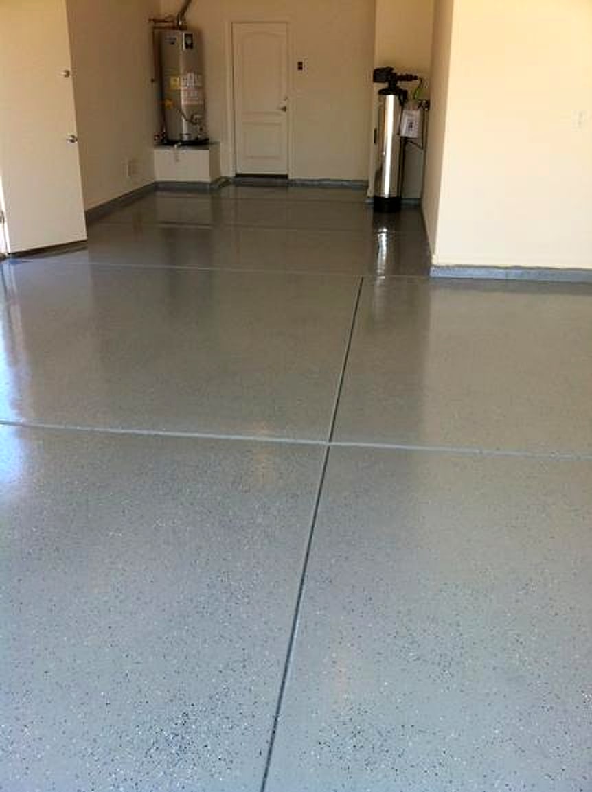 Grey flake epoxy garage floor with a clear coat