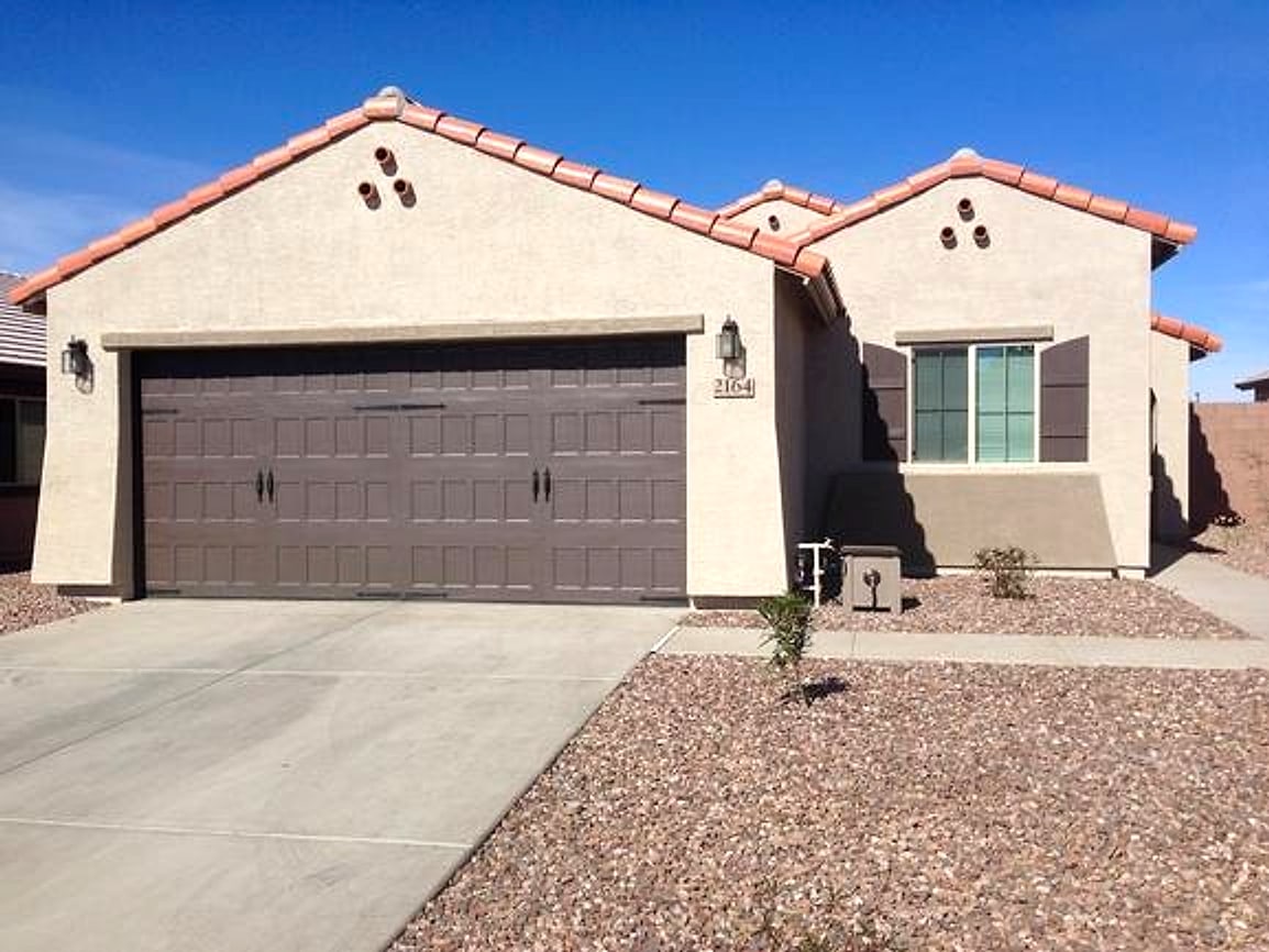 The same garage door painted dark brown